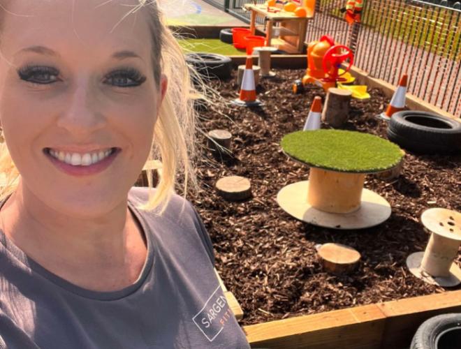 A woman next to a planter