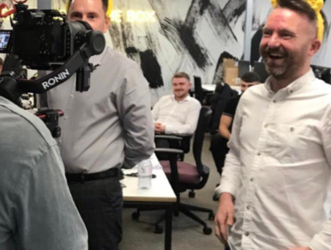 A group of people being filmed